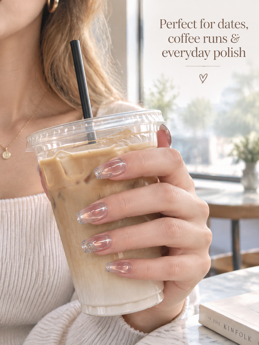 Rosewater Veil pink cat-eye press-on nails styled with iced coffee for an everyday look